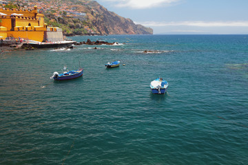 Fishing motor boats, island and sea. Funchal, Madeira, Portugal