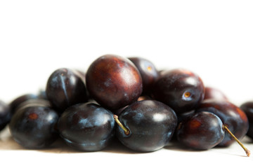 Plums isolated on white