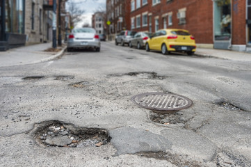 Large potholes in Montreal, Canada.