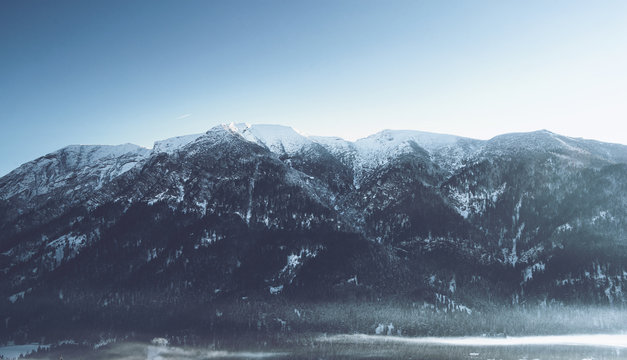 Snow-capped peaks in an alpine landscape