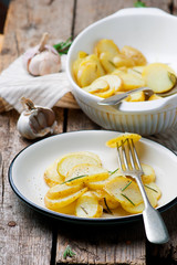 Baked new  potato with herbs .style rustic