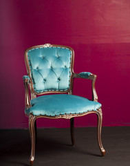 Luxurious blue armchair in the studio