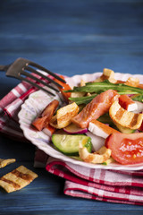 Salad with vegetables and red fish
