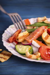 Salad with vegetables and red fish