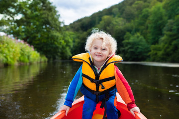 Little boy in kayak