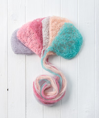 Multicolored woolen threads forming hat, topview