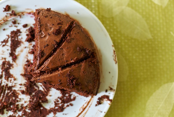 Homemade truffle-cranberry cake cut into pieces