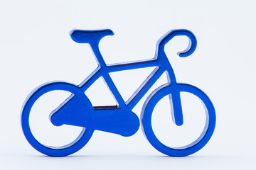 Blue toy bicycle isolated on white background