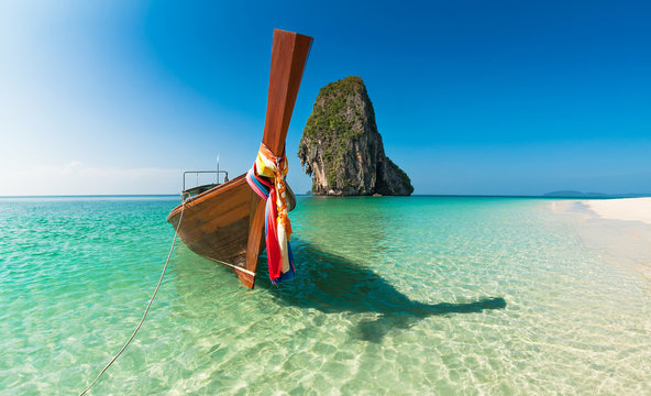 Boat and islands in andaman sea, Thailand