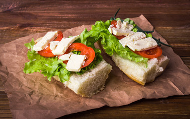 Sandwich on a wooden background