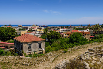 Fototapeta na wymiar View of the old town Rhodes on the background of blue sky, Rhodes island, Dodecanese, Greece.