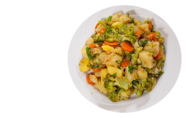 stewed vegetables on plate. top view. isolated on white