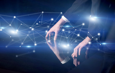 Hands touching interactive table