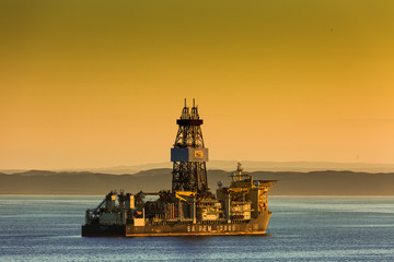 The Drill ship Saipem 1200 waits quietly of the coast of west Africa waiting for the oil downturn ...