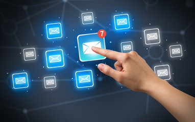 Hand touching mail icon
