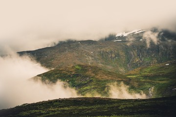Fototapeta na wymiar Foggy Norwegian Mountains