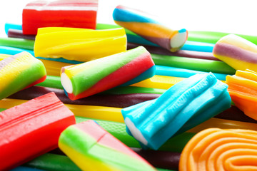 Tasty jelly candies on white background, closeup