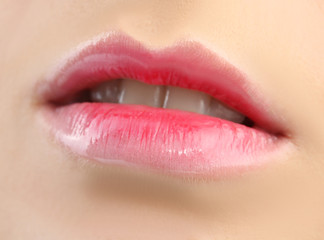 Fototapeta premium Lips of beautiful young woman, closeup