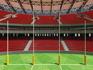 Naklejka premium 3D render of a round Australian rules football stadium with red seats and VIP boxes