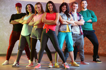 Group of young hip-hop dancers in studio