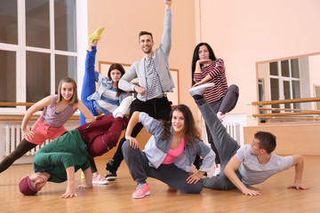 Group of young hip-hop dancers in studio