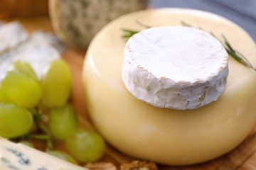 Cheese heads with grape, close up