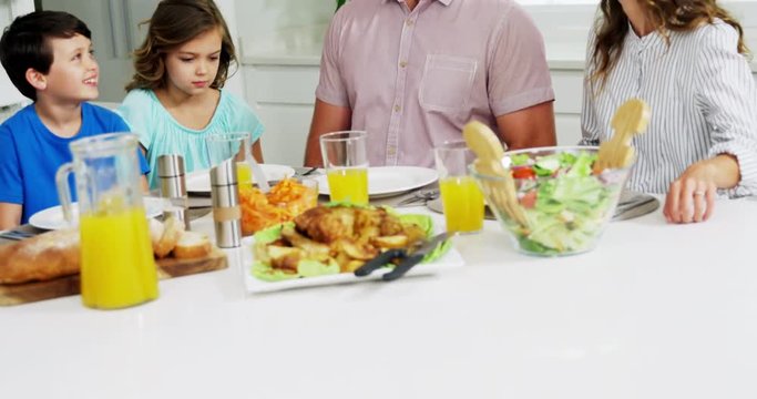Family having healthy meal together at home