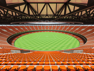 3D render of a round Australian rules football stadium with  orange seats and VIP boxes