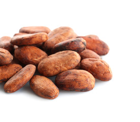 Aromatic cocoa beans on white background