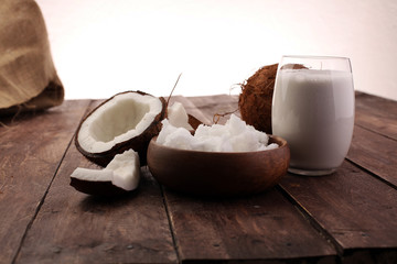 Coconut vegan milk non dairy in bottle and coconut oil