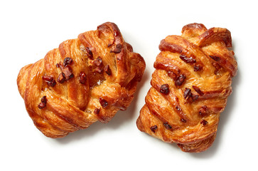 freshly baked pecan buns isolated on white