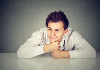Obraz premium Shot of a handsome man looking thoughtful and happy