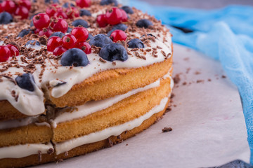 The coffee cake with fresh berries and a gentle biscuit sprinkled grated chocolate