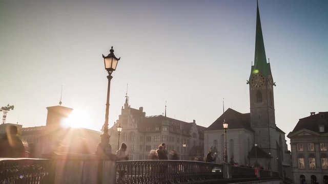 evening sun light zurich city famous fraum&uuml;nster church walking bridge panorama 4k time lapse switzerland
