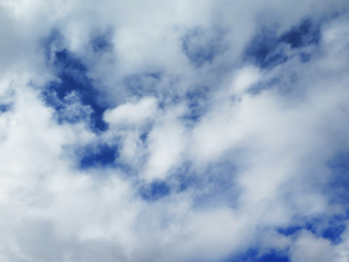 white fluffy clouds in the blue sky