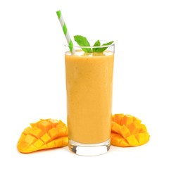 Healthy mango smoothie in a glass with mint and straw isolated on white