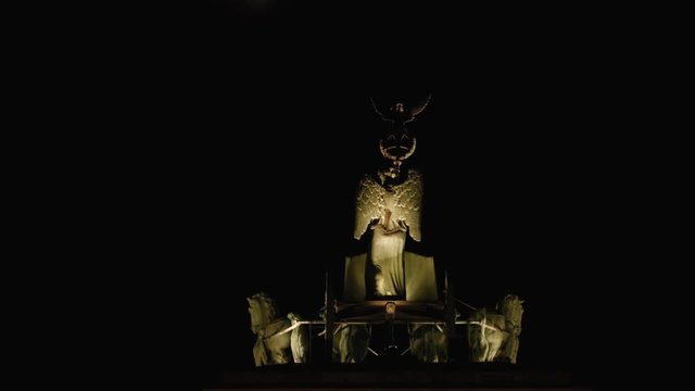 Time Lapse Of Illuminated Quadriga With Crescent Moon At Night