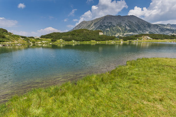 Naklejka na ściany i meble Panorama with Todorka Peak and reflection in Muratovo lake, Pirin Mountain, Bulgaria