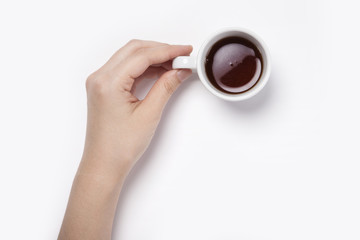 woman hand hold a espresso coffee cup isolated white.