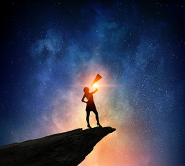 Fototapeta premium Businesswoman against starry sky . Mixed media . Mixed media