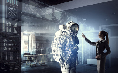 Scientists designing space suit. Mixed media . Mixed media © Sergey Nivens