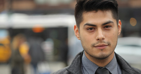 Obraz premium Young Hispanic Latino man in city face portrait