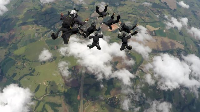 8 way skyding team with a cameraman