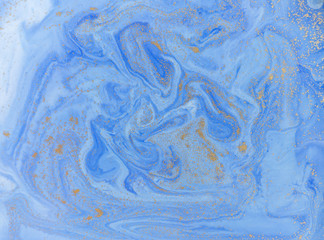 Blue and golden liquid texture. Watercolor hand drawn marbling illustration. Ink marble background.