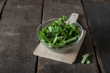 fresh cilantro salad, coriander with cucumber salad. Healthy food concept.