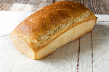 bread baked in the oven and eggs on the table