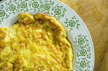 Close up omelet Thai food Style on dish.