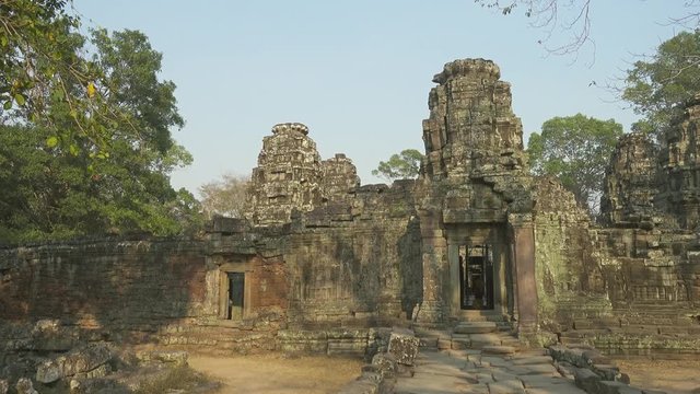 Ta Prohm temple in Angkor Wat, Siem Reap, Cambodia, pan view, 4k
