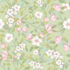 Seamless pattern with floral motifs. Pattern with flowers of apple and leaves