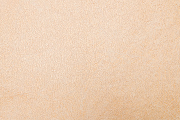 Beige brown suede soft leather as texture background.